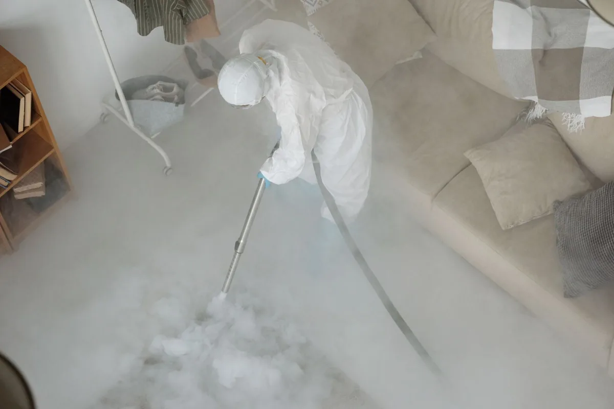 Biohazard cleanup technician in protective equipment, Inverness Highlands South, FL